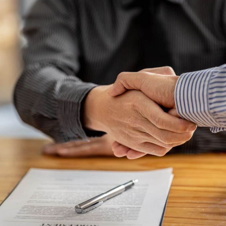 Lawyers Shake Hands With Clients Who Come To Testify In The Case