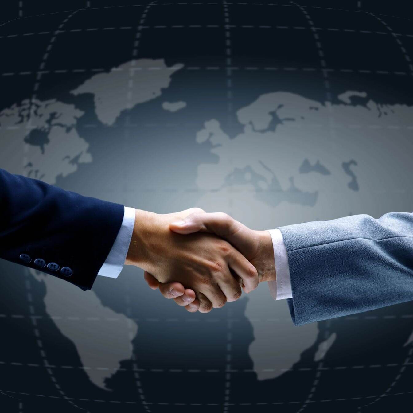 img-handshake Handshake With Map Of The